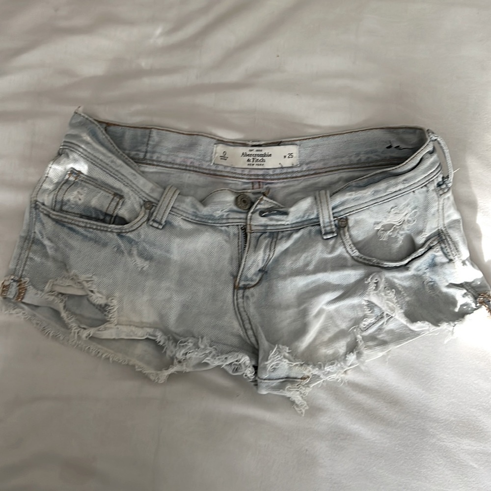 Light blue denim distressed shorts